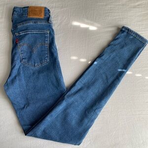 721 High Rise Skinny Jeans